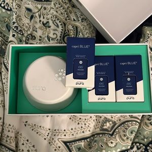 Pura diffuser + 3 capri blue volcano refills. gently used